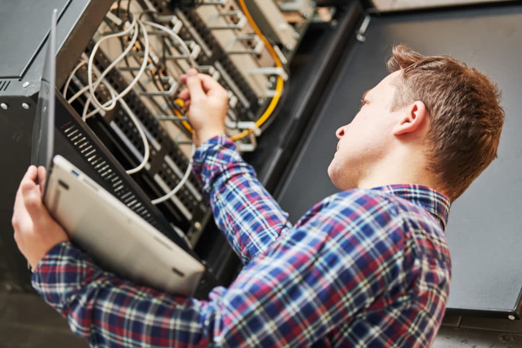 network engineer admin works with server equipment IT Services
